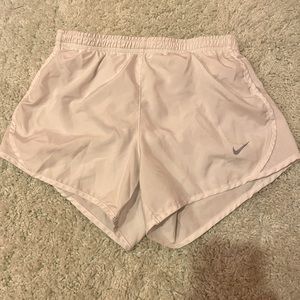 This is Nike Kids white athletic shorts